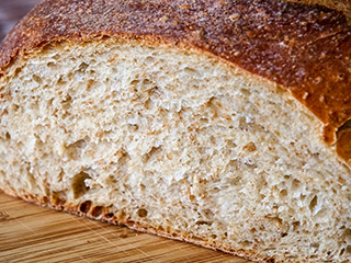 Moist, airy crumb with flecks of whole wheat Moist, airy crumb with flecks of whole wheat