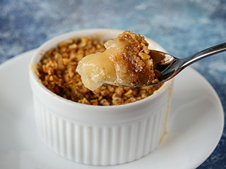 Digging into an apple crisp Digging into an apple crisp