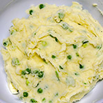 Mashed Potatoes with Sour Cream, Peas and Scallions